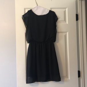 Little black dress with gold beading on sleeves